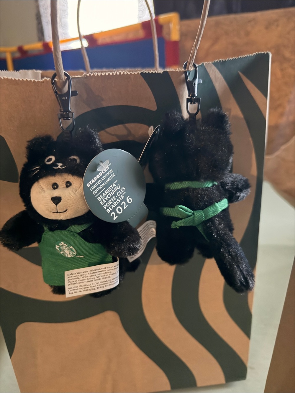 Starbucks limited edition bearista in a car suit.